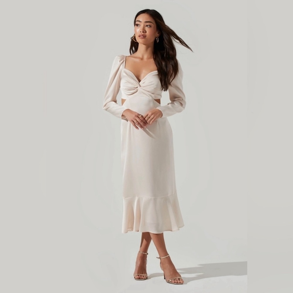 Like new w tag astr the label ivory dress (PLEASE 
READ DESCRIPTION FOR FLAW)
